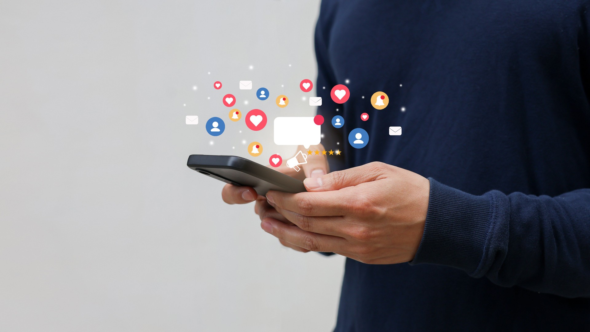 close up young man hand hold smartphone to use and work about futuristic of social media marketing icon for internet network technology and business concept